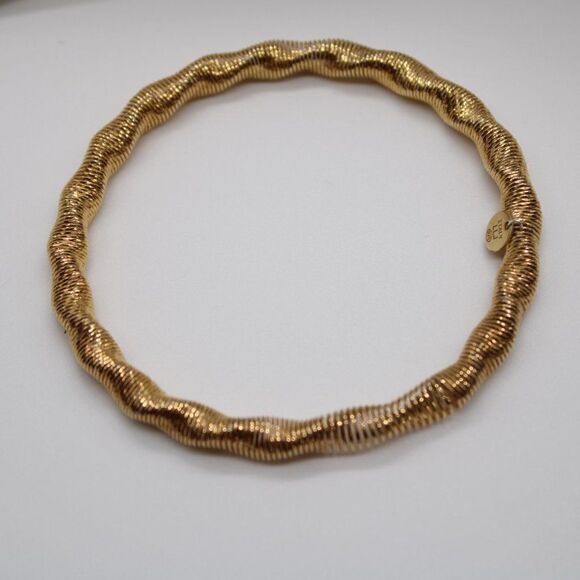 Sterling Silver Gold-tone Stretch Bangle by Leslie's - Picture 1 of 10